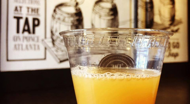 Hazy beer pour outside The Tap on Ponce. 